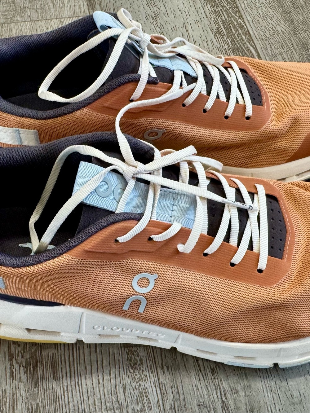 On Running Women’s Cloudgo Orange Mesh Sneakers with White Laces